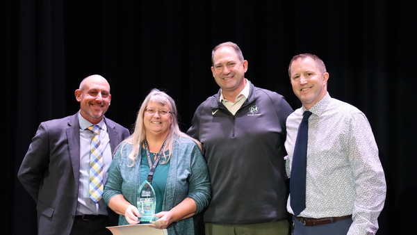 Mrs. Badeau is presented with the One Berrien Award