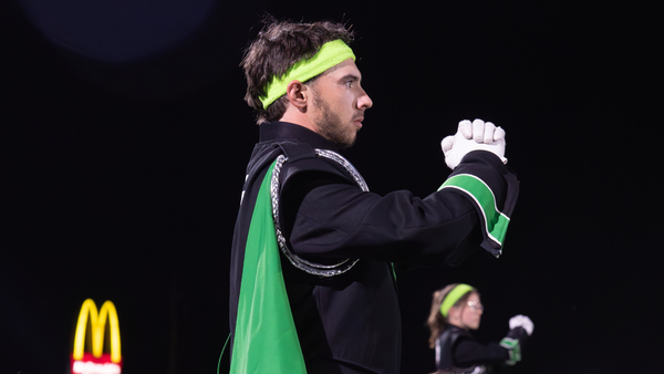 Drum Major Jonathan Orlando directs the band at the Marching Festival.