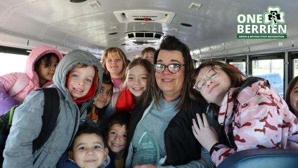 Ms. Hyche accepted her award with her students.