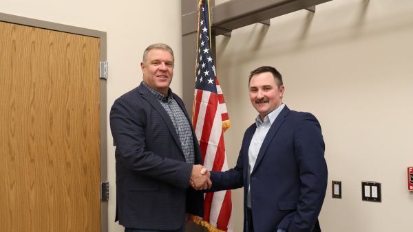 Mr. Turner is welcomed by Board President, Mr. Paul Toliver
