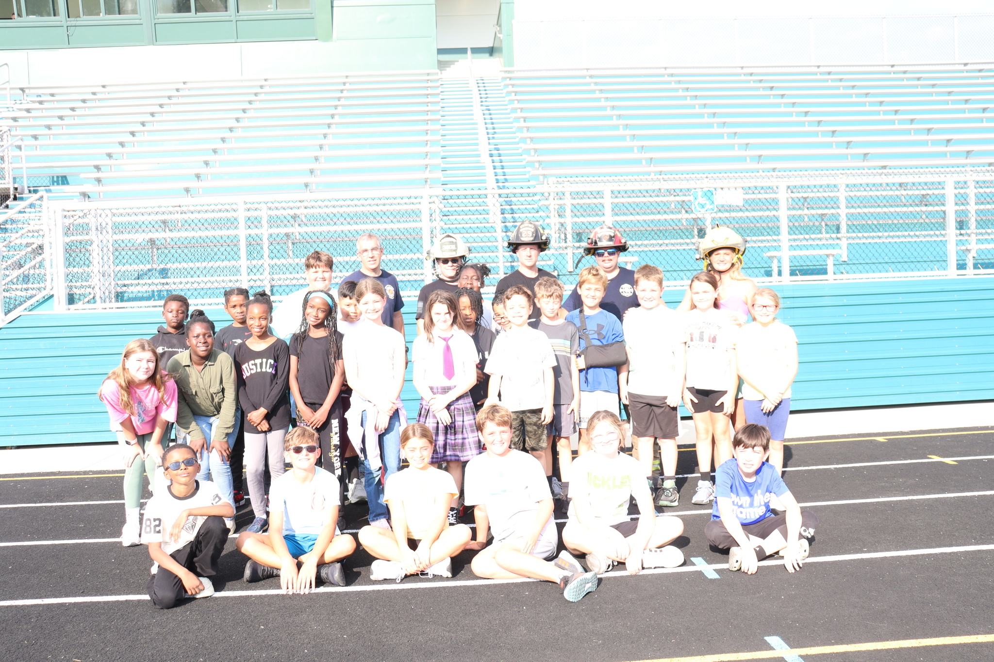 Sylvester Elementary students and local firefighters honor heroes of 9/11.